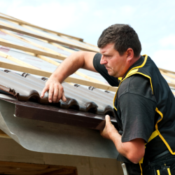 guy repairing the roof
